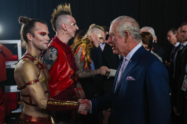 King Charles shake hands with members of Lord of the Lost, Germany's Eurovision 2023 rep